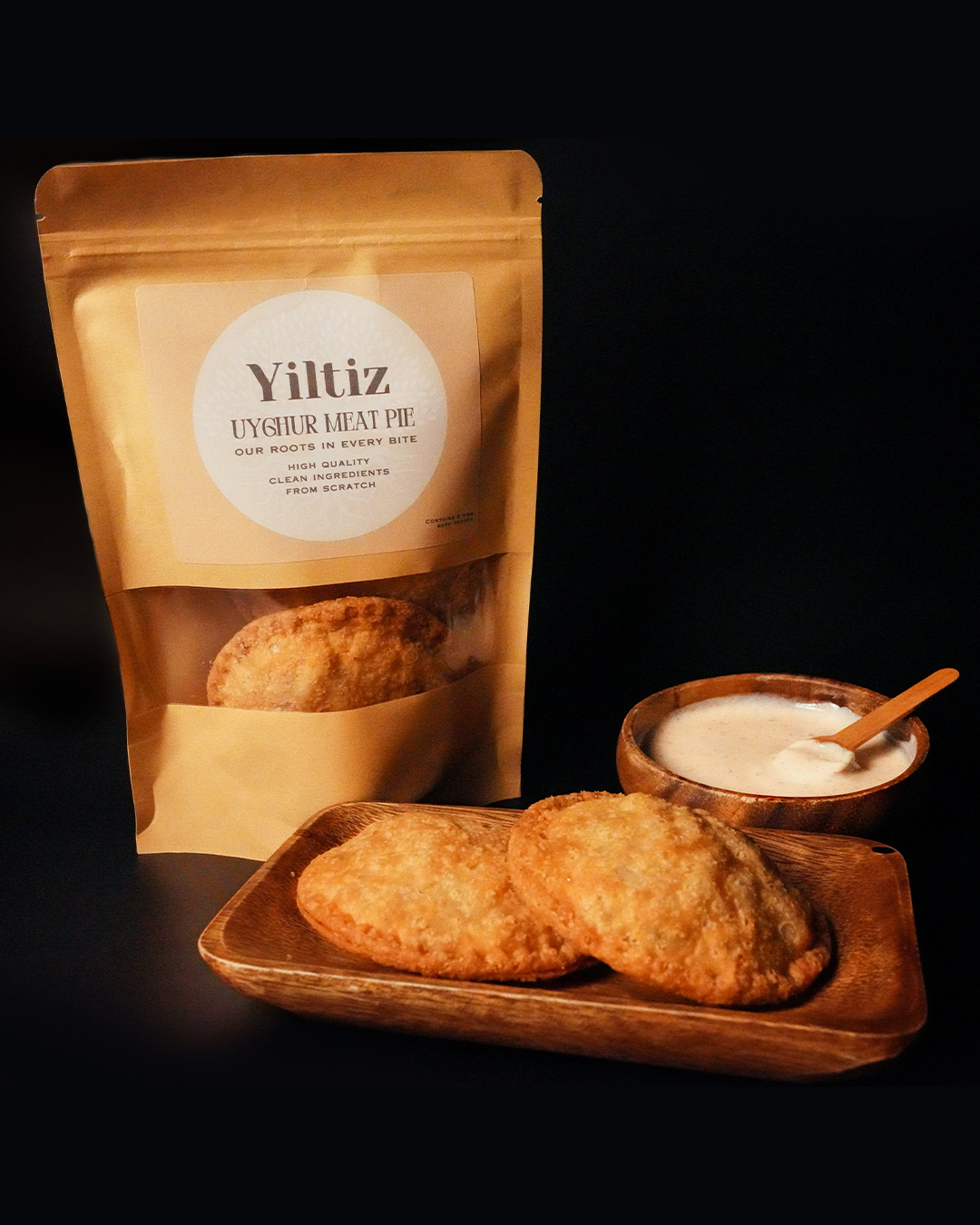 “A delicious meat pie package displayed - Yiltiz
